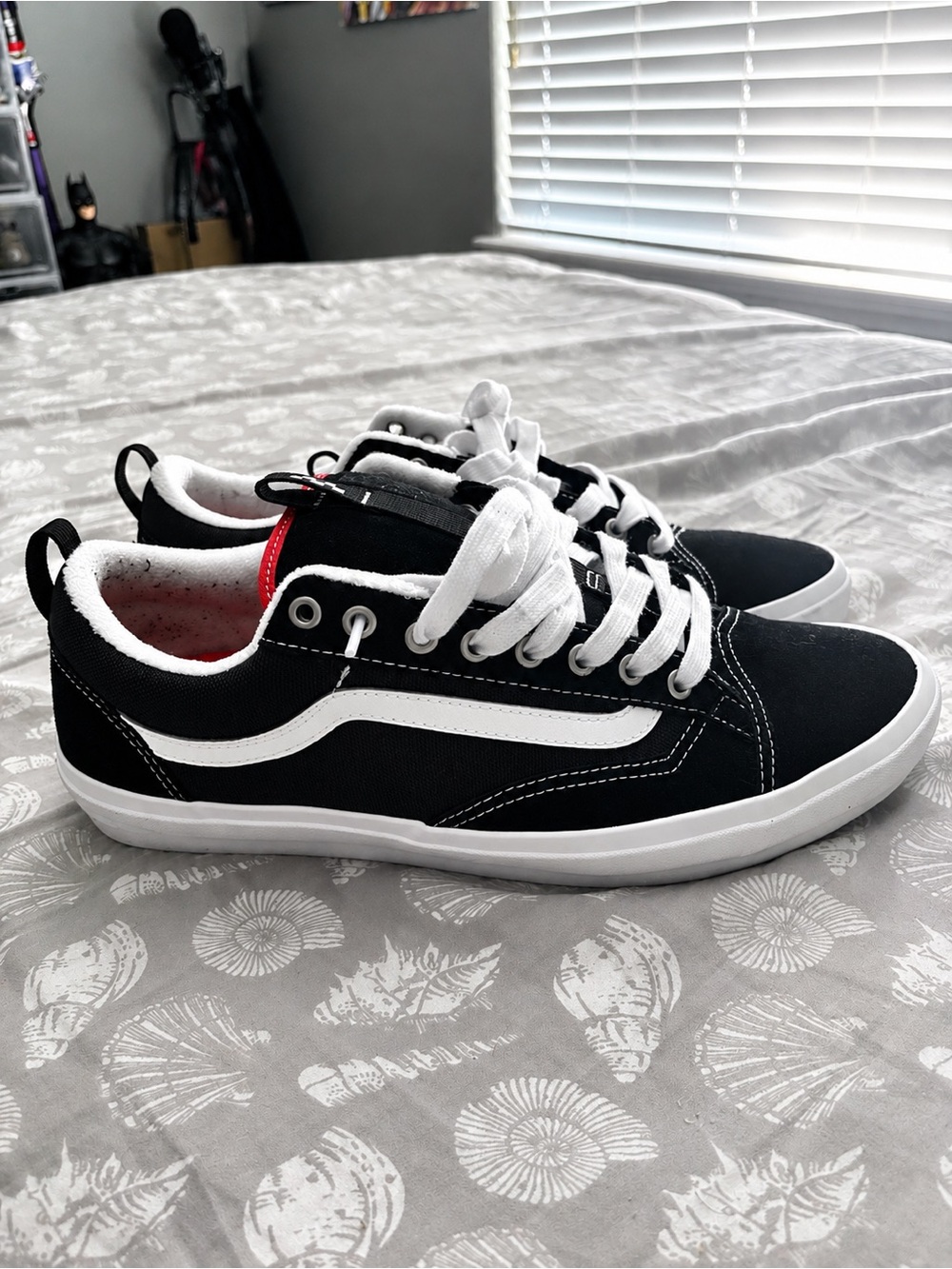 Vans Black & White Low-Top Canvas Sneakers with Red Heel Accent